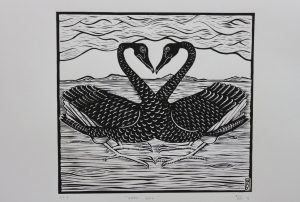 A print of two black swans at the Factory Arts art auction
