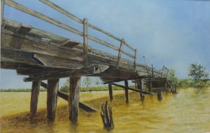 A painting of a delapidated wooden bridge at the Hopkins River Art Group show at the Outlaw Gallery