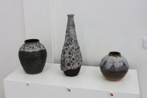 Three ceramic posts from Judy Rauert's 'Tower Hill Inspired' exhibition at the Outlaw Gallery