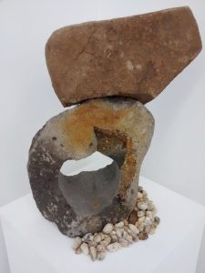 An artwork of carved stone and gravel