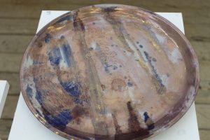 A mulitcoloured ceramic plate